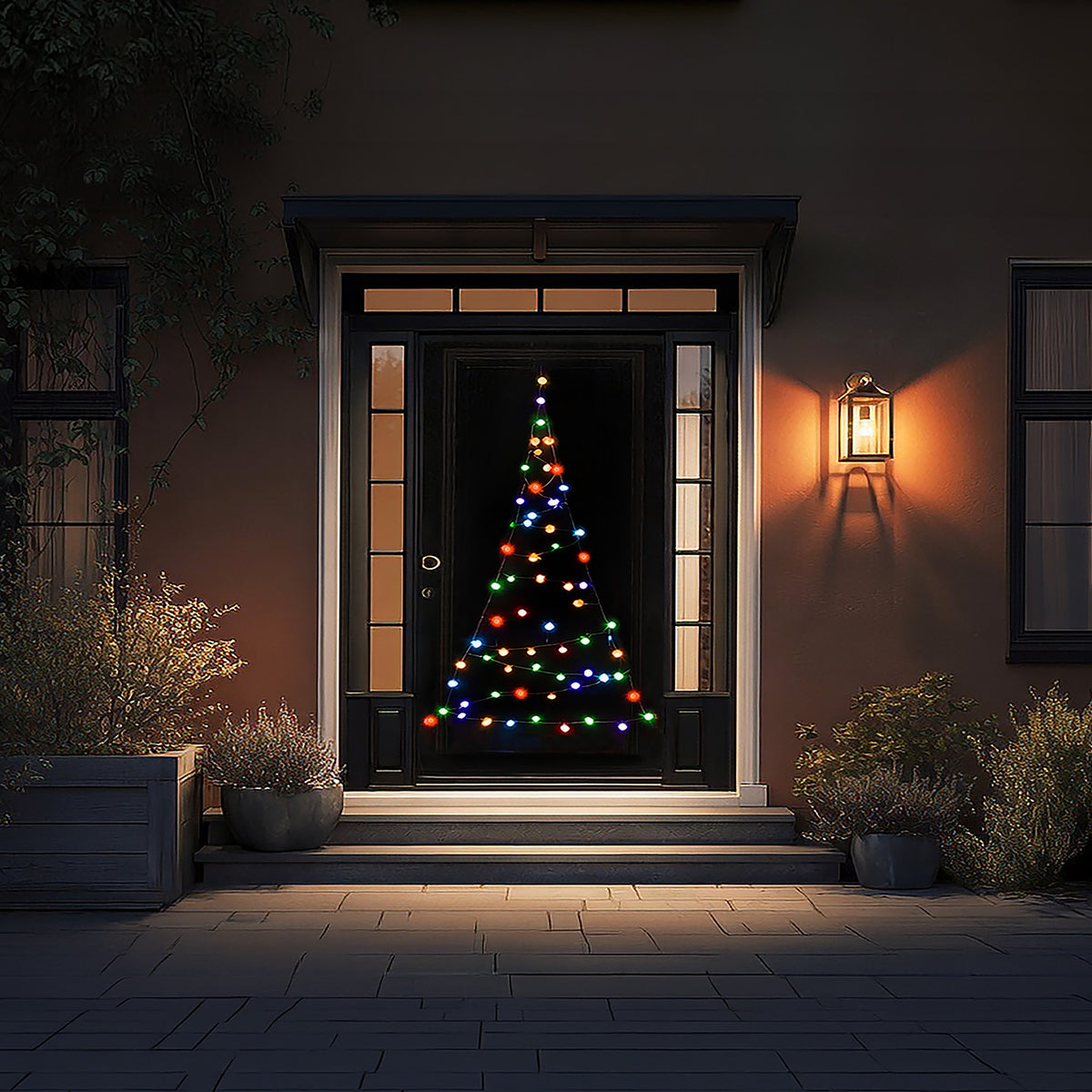 Fairybell Premium Door Tree 2.1 metre in multicolour mode on a dark front door with stone steps