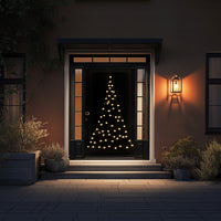 Warm white Fairybell Premium Door Tree 2.1 metre on a front door with steps and a wall lamp in the evening